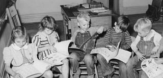 Children_reading_1940-522x250.jpg