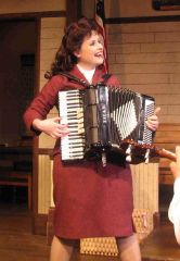 Denise playing accordian